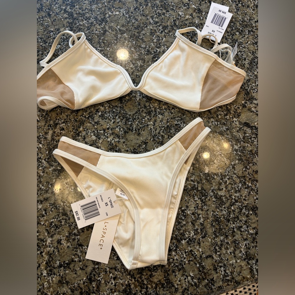 L space Troy bitsy bottom and matching top in Xs. Brand new, tags attached